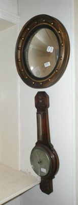 Lot 835 - An oak cased barometer and a gilt framed circular wall mirror