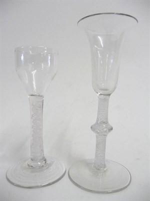 Lot 18 - A Wine Glass, circa 1765, the slender bell bowl on a multiple spiral opaque twist stem with central
