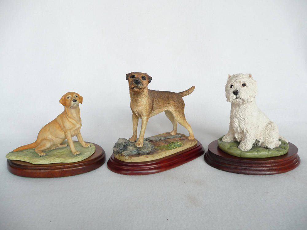 Lot 1049 - Three Border Fine Arts Dogs, 'Border Terrier', model A3229; 'West Highland Terrier', model MT10 and