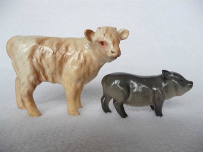 Lot 1077 - Beswick Charolais Calf, model No. 1827B, cream gloss, 7.6cm high and a Royal Doulton Vietnamese...