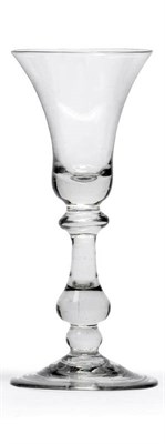 Lot 26 - A Balustroid Wine Glass, circa 1740, the bell bowl on an upper flattened knop and lower...
