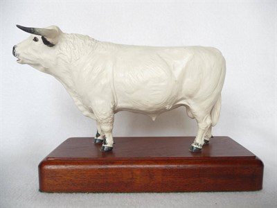 Lot 1103 - A Shebeg Pottery White Park Bull, modelled by John Harper, cream with grey/black hooves, horn tips