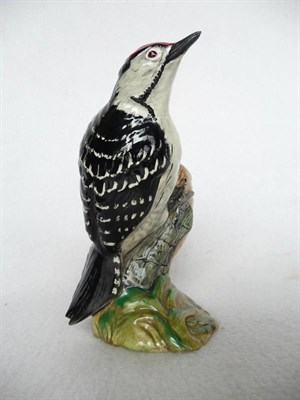 Lot 1108 - Beswick Lesser Spotted Woodpecker on branch, model No. 2420, red, white and black gloss, 14cm high