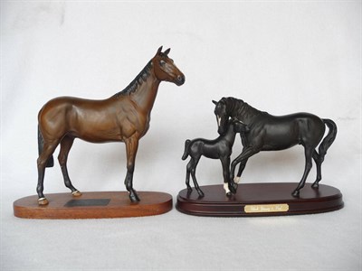 Lot 1125 - Beswick horse group 'Black Beauty & Foal', models 2466 and 2536, black matt, 18.4cm and 15.2cm high