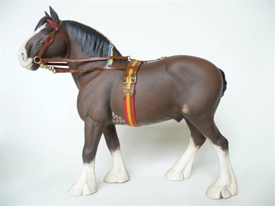 Lot 1134 - Beswick Clydesdale Horse in harness, model No. 2465, brown matt, 27.8cm high