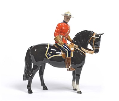 Lot 1155 - Beswick Canadian Mountie, model No. 1375, black horse, gloss, 21cm high (restorations)