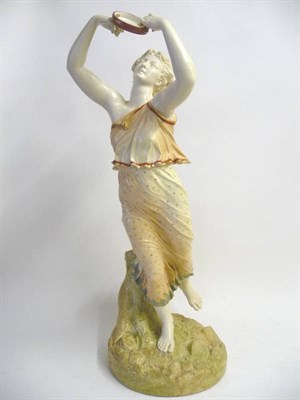Lot 42 - A Royal Worcester Porcelain Large Figure of a Tambourinist, 1899, modelled as a classical muse,...