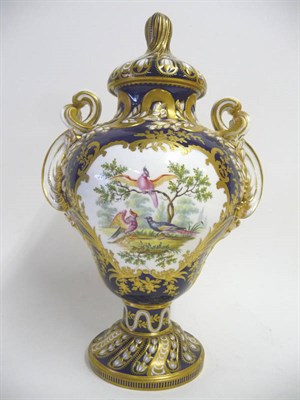 Lot 51 - An English Porcelain Rococo Vase and Cover, probably Coalport, circa 1830, of ogee outlined...