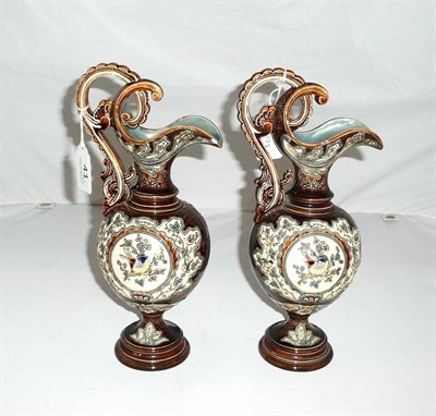 Lot 41 - Pair of late 19th century Austrian pottery ewers