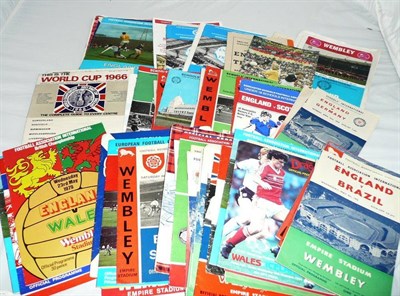 Lot 79 - Fifty International Football Programmes from 1947 to 1970's, including England v Scotland 1947...
