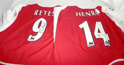 Lot 91 - Two 1996 Replica Arsenal Football Shirts, one signed by Thierry Henry, the other by Jose Reyes.