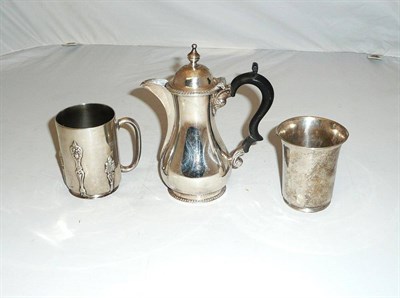 Lot 144 - A small silver mug, London assay, a white metal engraved beaker and a silver hot water jug