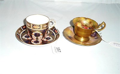 Lot 157 - Royal Crown Derby Imari cup and saucer and a Worcester fruit study cup and saucer