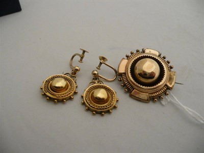 Lot 235 - A round brooch and a similar pair of drop earrings