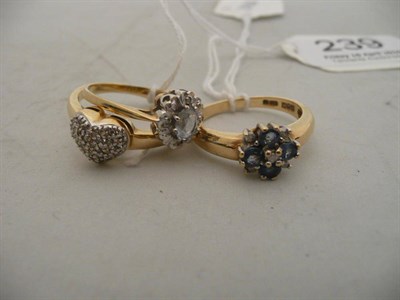 Lot 239 - A 9 carat gold sapphire cluster ring and two 9 carat gold rings