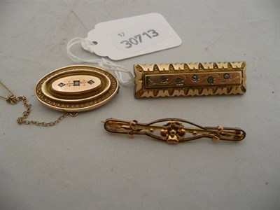 Lot 245 - Two diamond set Victorian brooches and a floral bar brooch