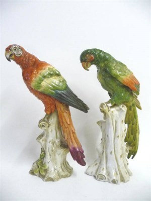 Lot 72 - A Naples Porcelain Model of a Green Parrot, circa 1900, perched on tree stump, its plumage...