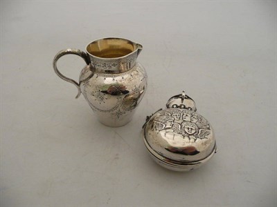 Lot 248 - Silver cream jug and silver-cased smelling salts bottle