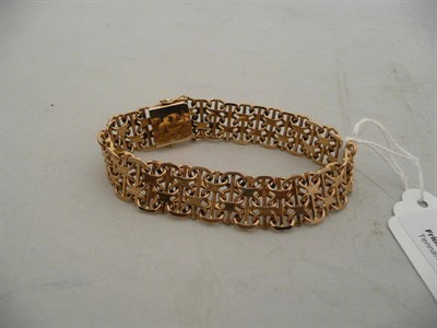 Lot 262 - A 9 carat gold fancy bracelet, 26.7g approximately