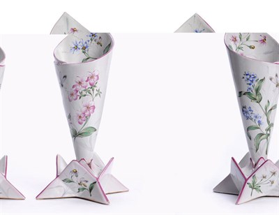 Lot 76 - A Pair of St Clement Faience Vases, circa 1890-1900, modelled to imitate napkins folded into...