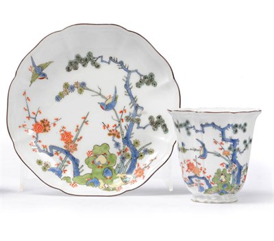 Lot 96 - A Meissen Porcelain "Kakiemon" Fluted Beaker and Saucer, circa 1735, of bracketed circular...