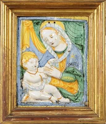 Lot 101 - An Italian Maiolica Virgin and Child Relief Moulded Plaque, Deruta, 16th/17th century,...