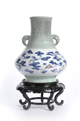 Lot 105 - A Chinese Underglaze Blue, Red and Celadon Glazed Porcelain Vase, 19th century, of dumpy...