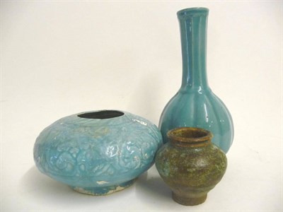 Lot 132 - A Persian Turquoise Monochrome Bottle Vase, in late Safavid Period Style, 19th century, of...