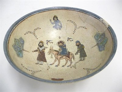 Lot 133 - A Kashan Mina'i Enamelled Fritware Bowl, possibly 12th/13th century, painted inside with a turbaned