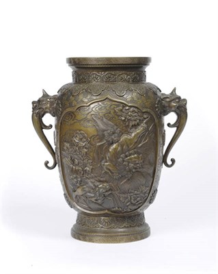 Lot 137 - A Japanese Bronze Two-Handled Vase, Meiji Period (1868-1912), cast in high relief, lappets to...