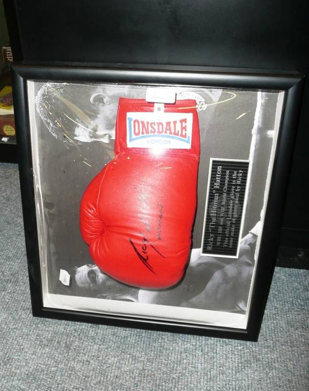 Lot 126 - A boxing glove signed by Ricky Hatton in a glazed display