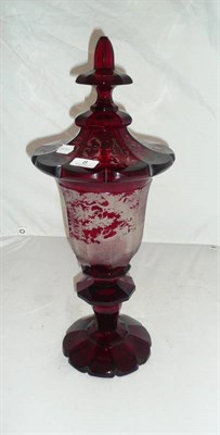 Lot 8 - Bohemian red glass pedestal vase and cover decorated with stags