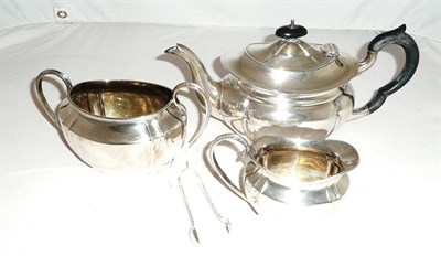 Lot 26 - Three piece silver tea set and a pair of silver tongs