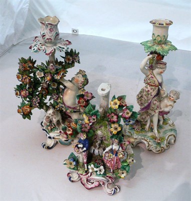Lot 51 - Three 18th century porcelain figural candlesticks (a.f.)
