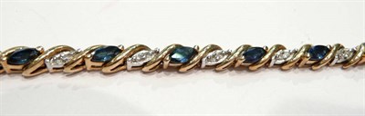 Lot 99 - A diamond and sapphire line bracelet