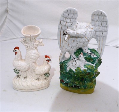 Lot 128 - Staffordshire figure of an eagle and a hen spill vase
