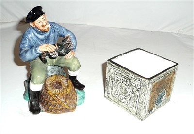 Lot 132 - Small Troika square vase and a Royal Doulton figure the Lobster Man (2)