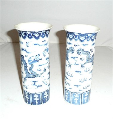 Lot 156 - A pair of blue and white sleeve vases (2)