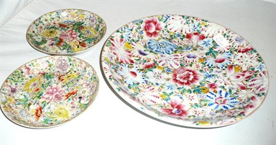 Lot 164 - A Chinese millefiori charger and two plates