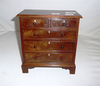 Lot 166 - Miniature mahogany chest of drawers