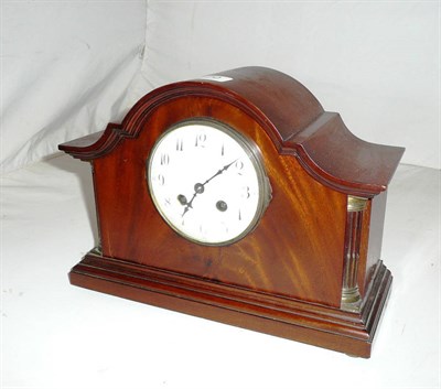 Lot 170 - A mahogany striking mantel clock