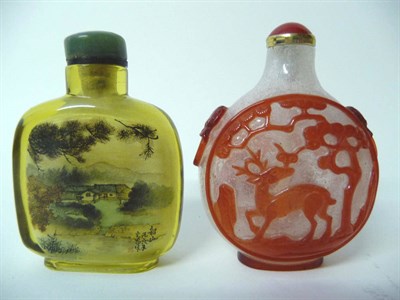 Lot 168 - An Interior Painted Glass Snuff Bottle, 18th/19th century, of amber hue, decorated with mountainous