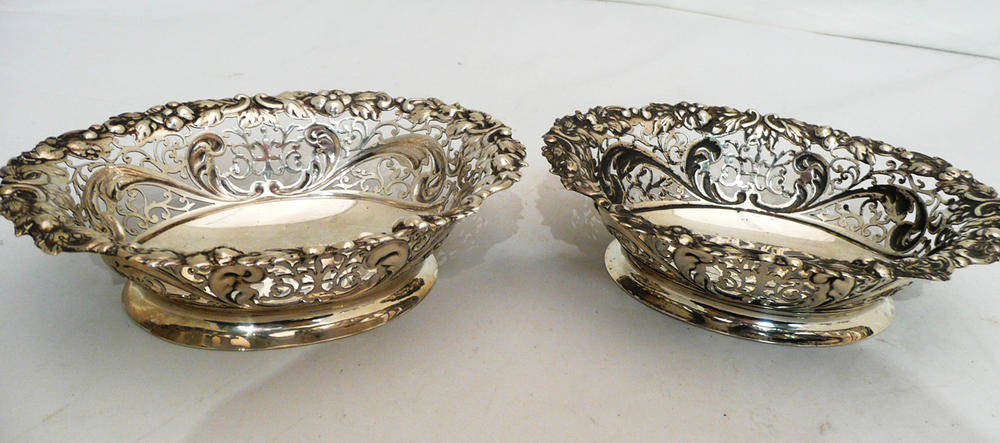 Lot 203 - A pair of pierced silver baskets, London 1896