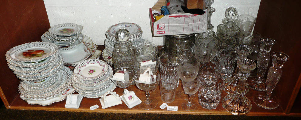 Lot 225 - Shelf of assorted continental ribbon plates, cut glass ware, decanters and stoppers, two pairs...