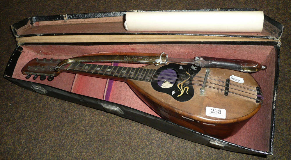 Lot 258 - A cased Italian mandolin by Giov.De Meglio and a Caucasian Kindjhal with brass and silver scabbard