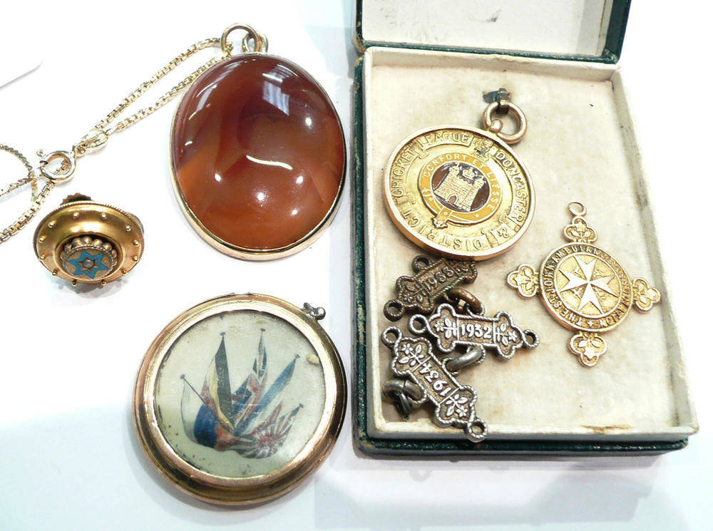 Lot 267 - An agate pendant on chain, a medal, a Victorian earring and a picture locket, etc