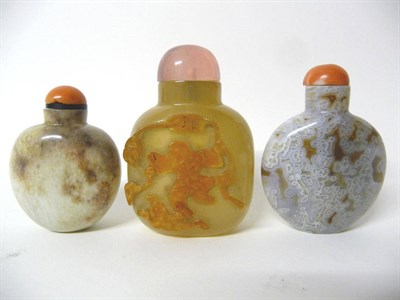 Lot 178 - An Agate Snuff Bottle, with rust relief with figure and three legged toad, 7cm; A Calcified...