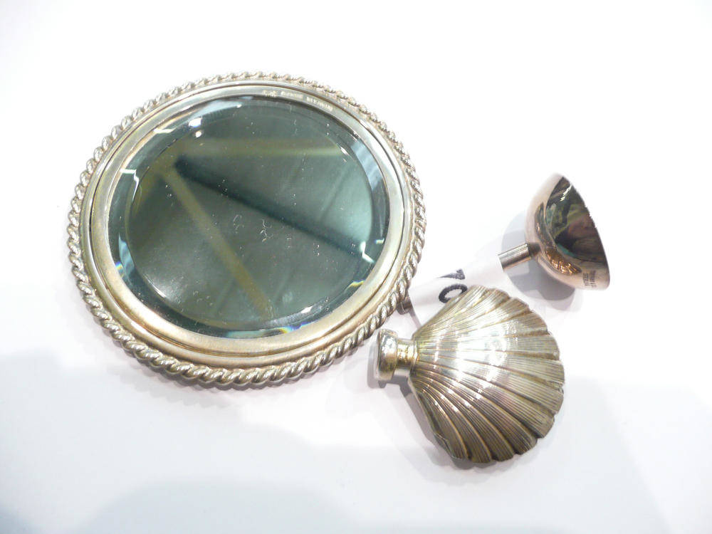 Lot 290 - Tiffany silver shell scent bottle with funnel and handbag mirror in bag