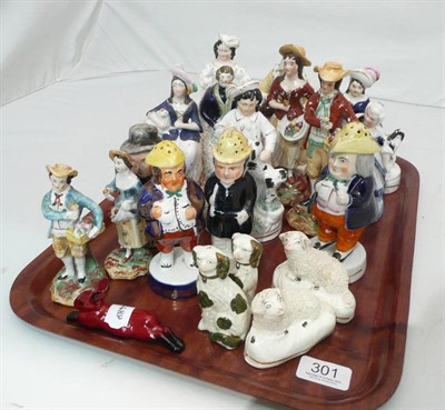 Lot 301 - Fifteen Staffordshire and other figures, a pair of small dogs, a pair of sheep, a Doulton rabbit