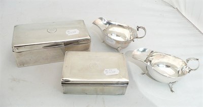 Lot 308 - Two silver sauce boats and two silver cigarette boxes